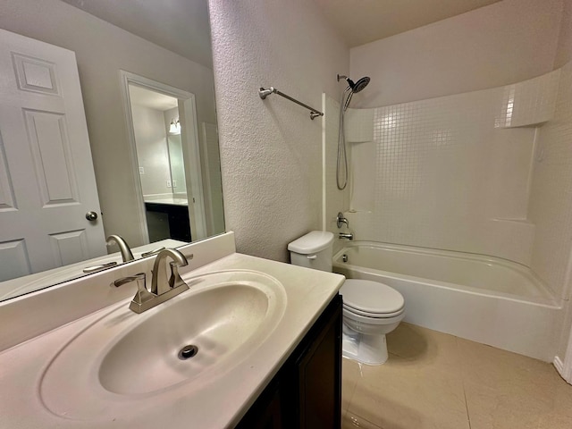 full bathroom with vanity, shower / tub combination, and toilet