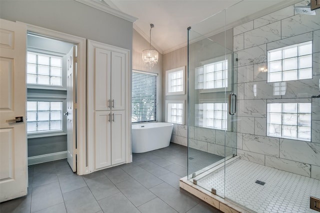 bathroom with lofted ceiling, tile patterned flooring, a notable chandelier, ornamental molding, and independent shower and bath