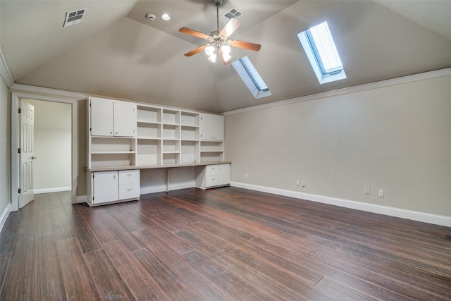 interior space with dark hardwood / wood-style floors, built in desk, high vaulted ceiling, a skylight, and ceiling fan