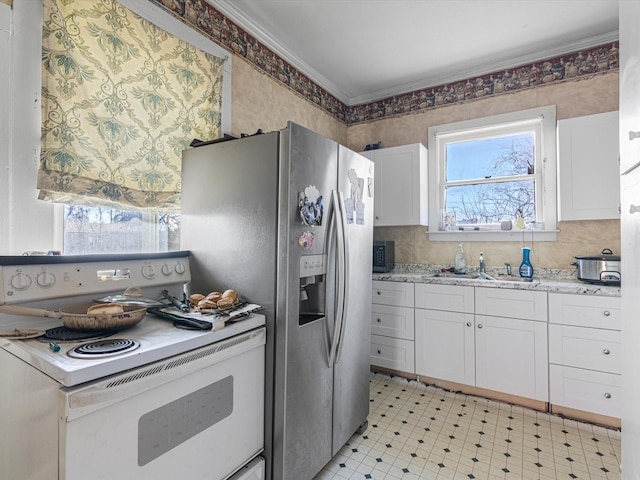 kitchen featuring white range with electric stovetop, sink, white cabinets, ornamental molding, and stainless steel fridge with ice dispenser