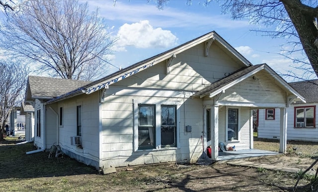 bungalow-style home with a patio area