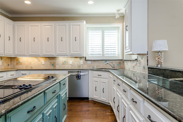 kitchen with dark hardwood / wood-style floors, white cabinetry, dishwasher, sink, and dark stone countertops