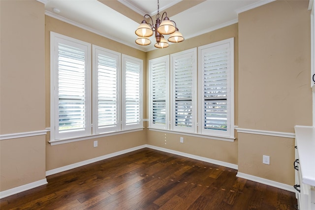 interior space with dark wood-type flooring, crown molding, and an inviting chandelier