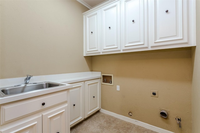 clothes washing area with sink, hookup for a washing machine, cabinets, hookup for a gas dryer, and hookup for an electric dryer