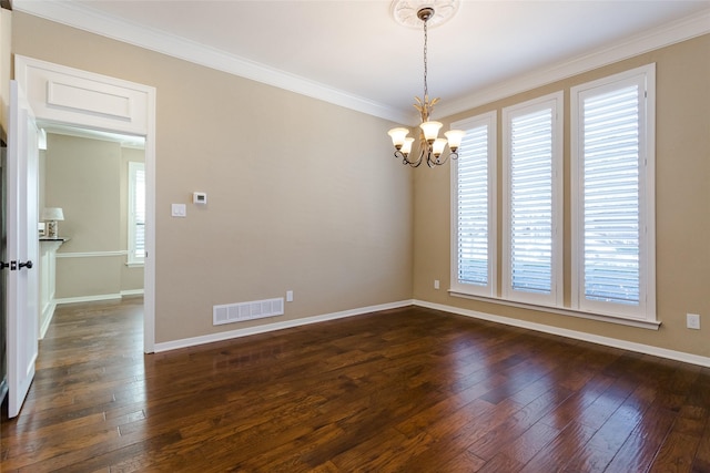 unfurnished room with dark hardwood / wood-style flooring, a notable chandelier, and ornamental molding