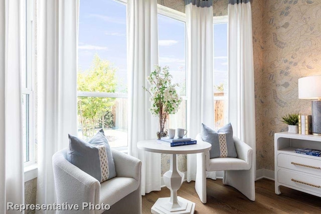 sitting room featuring hardwood / wood-style floors