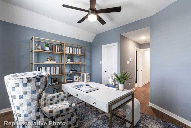 office with ceiling fan, lofted ceiling, and dark hardwood / wood-style flooring