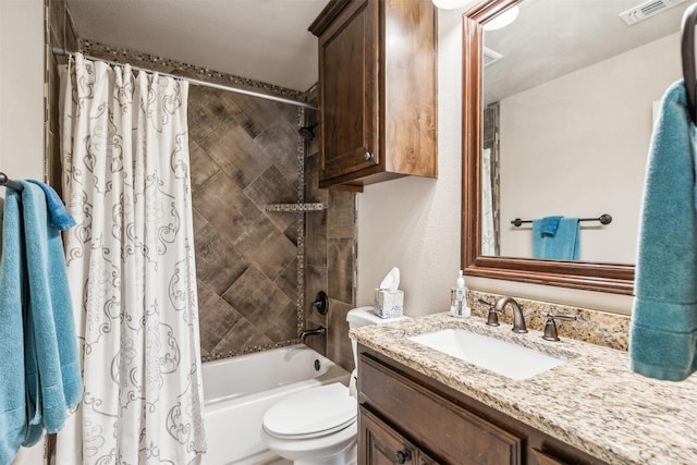 full bathroom featuring shower / tub combo with curtain, vanity, and toilet