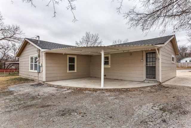 back of house with a patio area