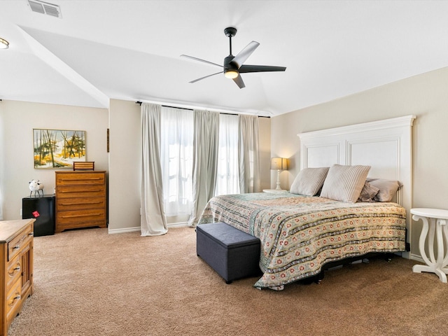 carpeted bedroom with lofted ceiling and ceiling fan