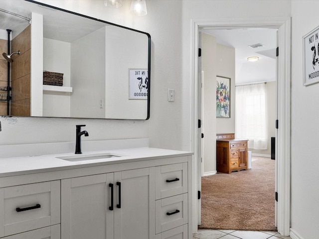 bathroom with vanity and walk in shower