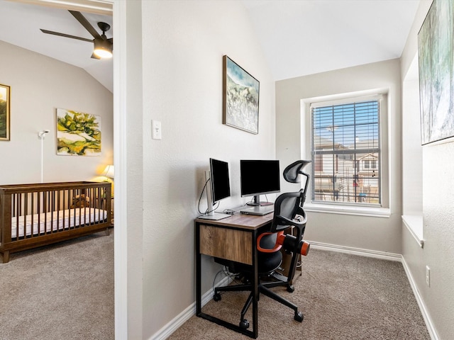 carpeted office with vaulted ceiling and ceiling fan