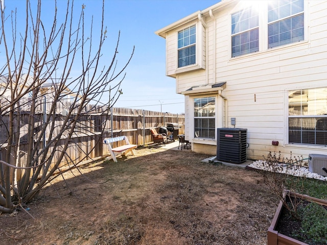 view of yard featuring central AC