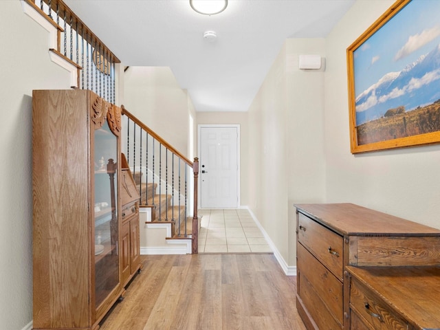 foyer with light hardwood / wood-style floors