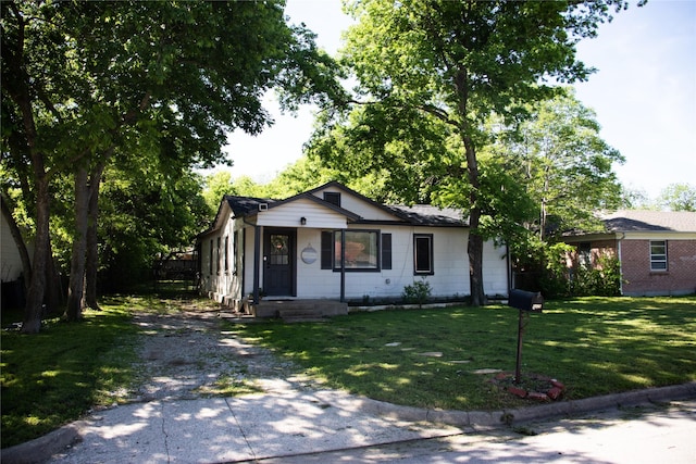 view of front of home with a front yard