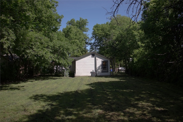 view of yard with central AC