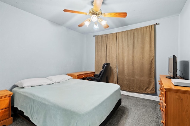 carpeted bedroom featuring ceiling fan