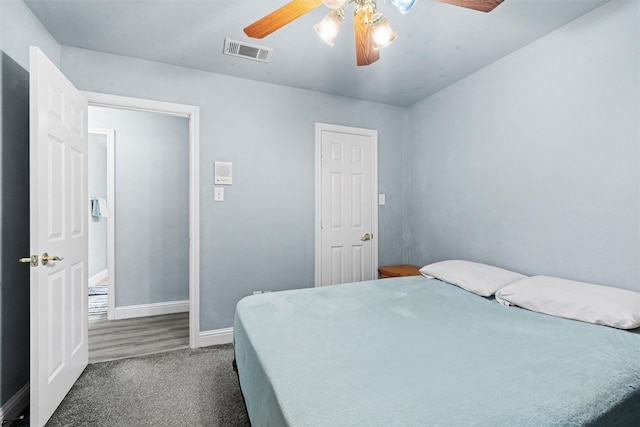 carpeted bedroom with ceiling fan