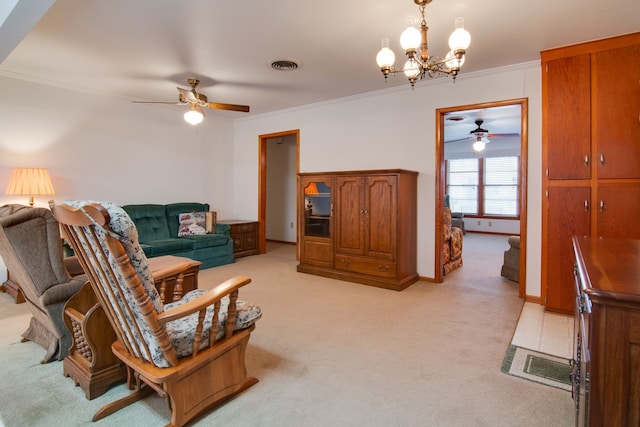 carpeted living room featuring crown molding and ceiling fan with notable chandelier