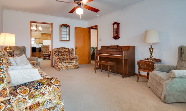 living room featuring light carpet, crown molding, and ceiling fan with notable chandelier