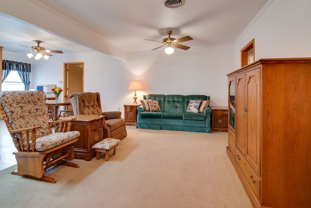 carpeted living room with crown molding and ceiling fan