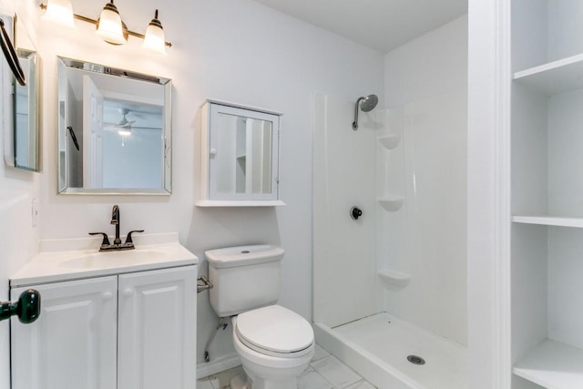 bathroom featuring marble finish floor, vanity, toilet, and walk in shower