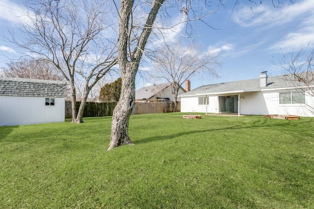 view of yard with a shed