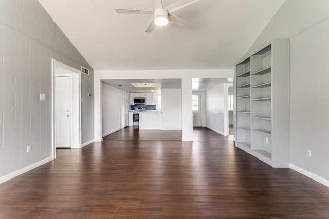 unfurnished living room featuring ceiling fan, lofted ceiling, dark hardwood / wood-style flooring, and built in shelves