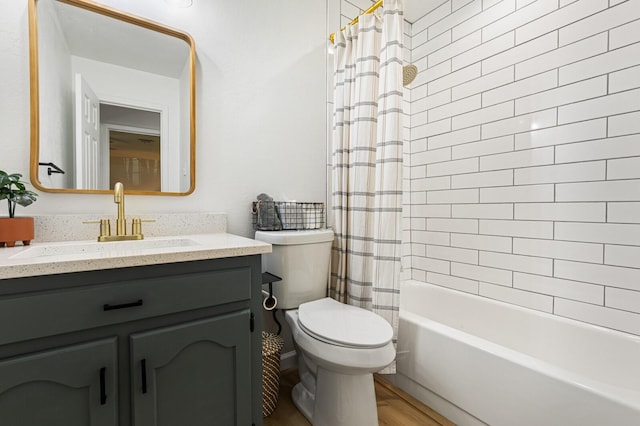 full bathroom featuring shower / tub combo with curtain, vanity, wood-type flooring, and toilet