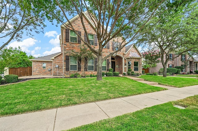 view of front of property featuring a front yard