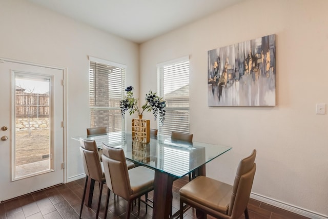 dining room featuring dark wood-type flooring