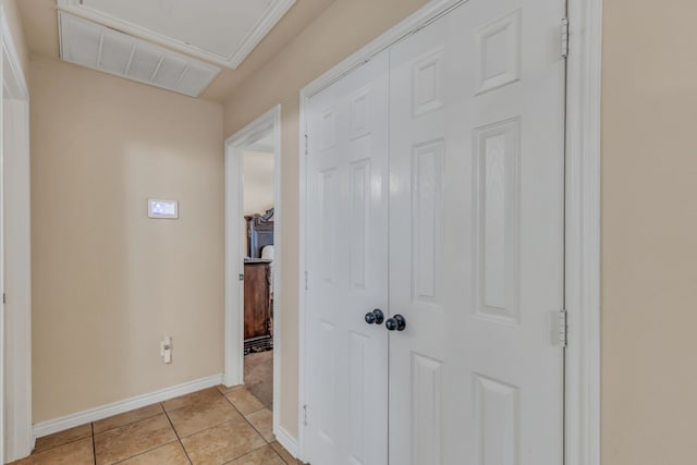 hall with light tile patterned flooring