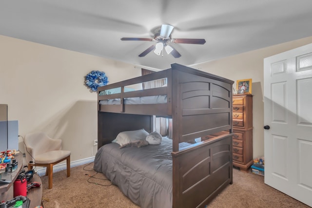 bedroom with light carpet and ceiling fan