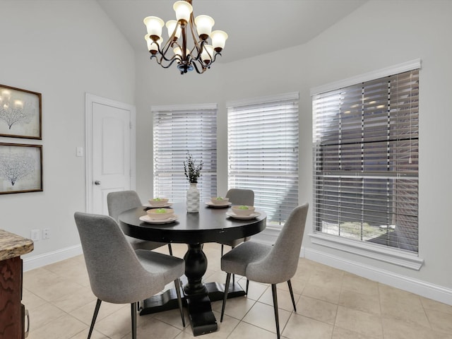 tiled dining room featuring vaulted ceiling and a notable chandelier