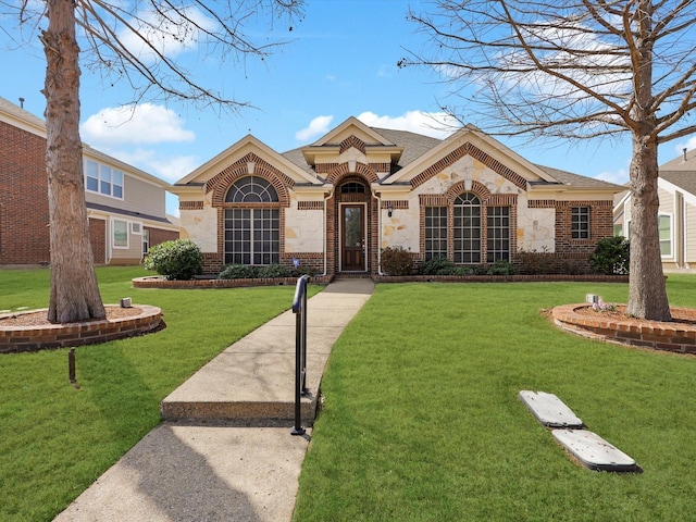 ranch-style home with a front yard