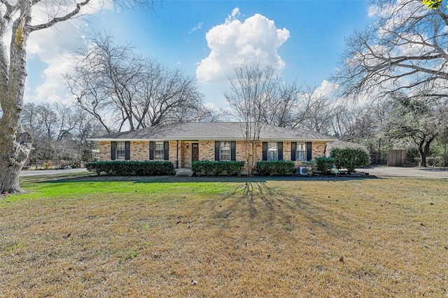 ranch-style house with a front yard