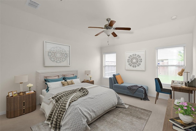 carpeted bedroom featuring ceiling fan