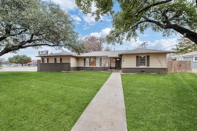 single story home featuring a front lawn