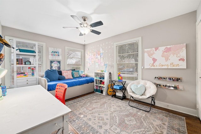 bedroom featuring hardwood / wood-style flooring and ceiling fan