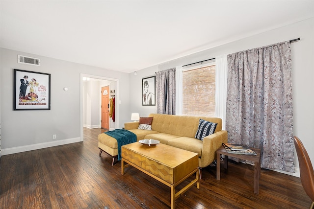 living room with dark wood-type flooring