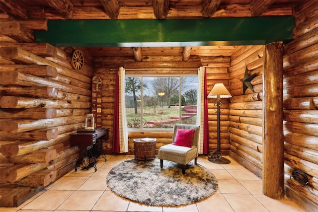 living area with beamed ceiling, light tile patterned floors, and log walls