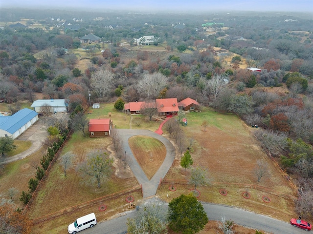 birds eye view of property with a rural view