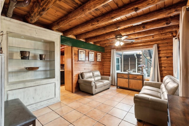 living room with wood ceiling, ceiling fan, rustic walls, light tile patterned flooring, and beamed ceiling