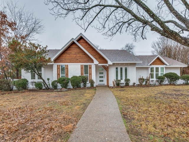 view of front of home with a front yard