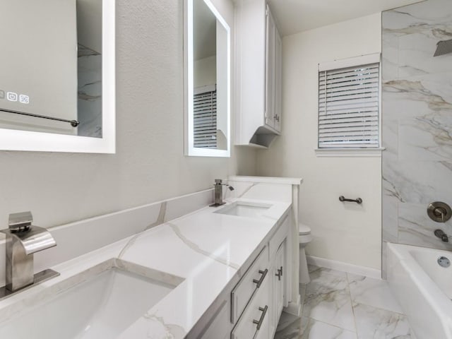 full bathroom featuring vanity, toilet, and washtub / shower combination