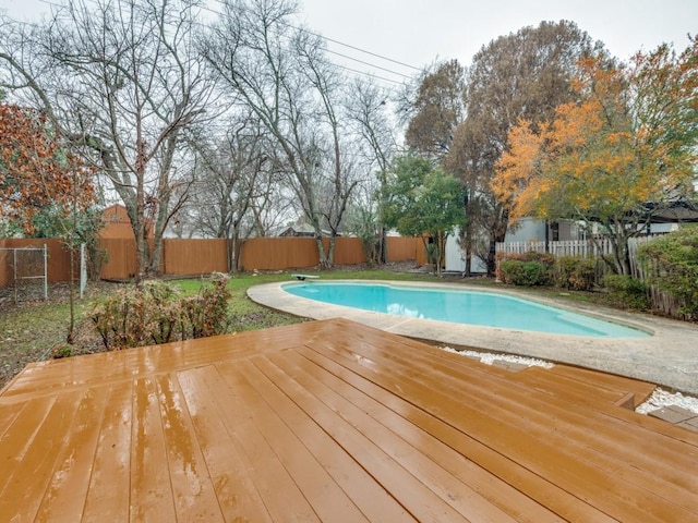 view of pool with a deck