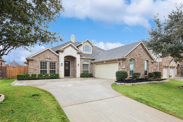 view of front of property with a front lawn