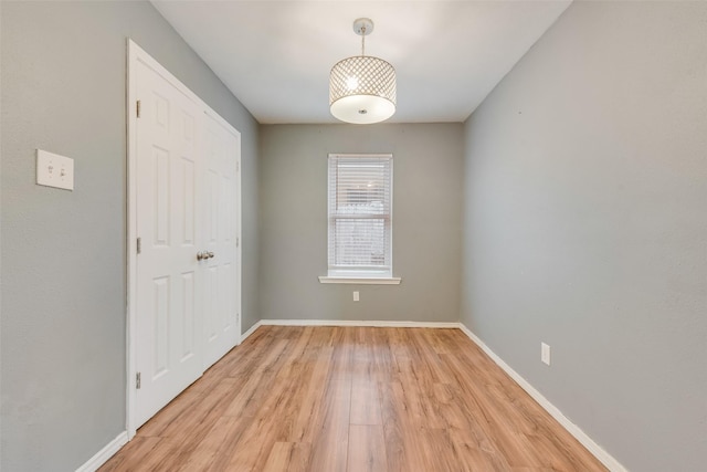 unfurnished room featuring light hardwood / wood-style floors