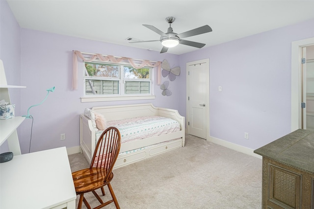 bedroom with light carpet and ceiling fan