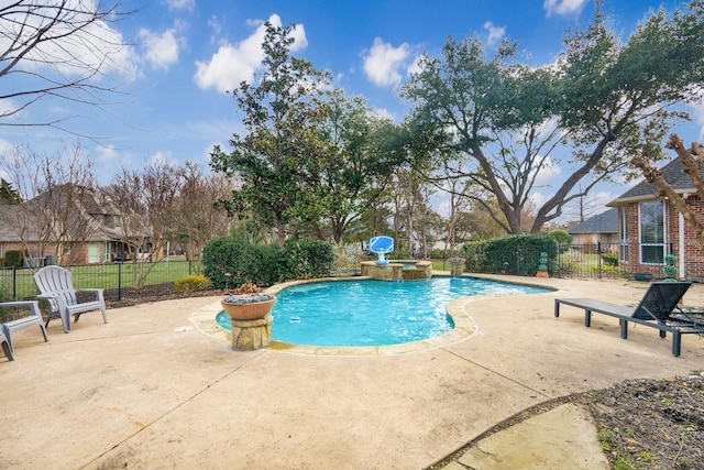 view of pool with an in ground hot tub and a patio